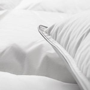 edge of white down pillow